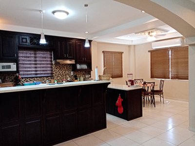H - View of Kitchen _ Dining Room From Living Area.jpg